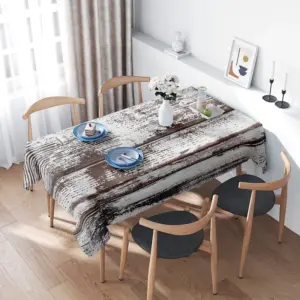 Wooden Dining Table with Matching Chairs Set featuring a Rustic Brown White Striped Tablecloth Perfect for any Home Decor Style!